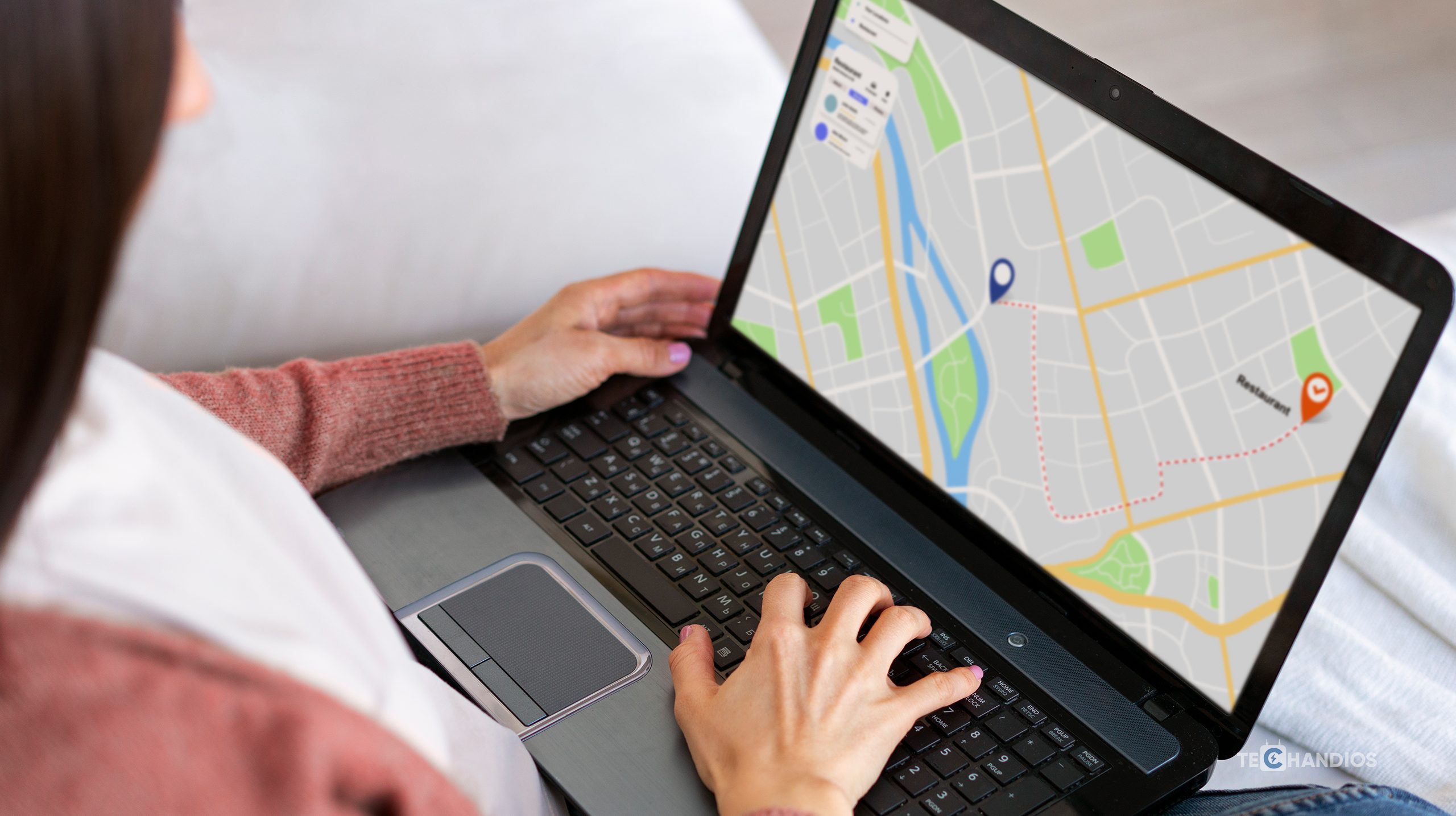 Woman seen map on laptop - Techandios