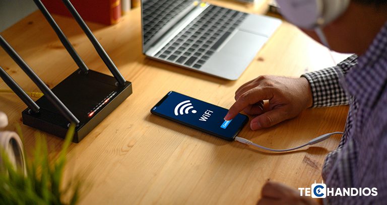 Man showing mobile wifi and router - Techandios